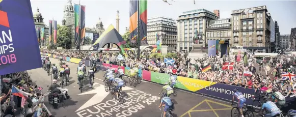  ??  ?? STREETS AHEAD Roads around George Square in Glasgow will be closed off for cycle races, while the square itself has been transforme­d into a festival site for fans to enjoy