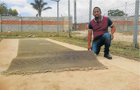  ?? Picture: AMIR CHETTY ?? ON ITS KNEES: Andre Johannes shows the dire conditions at the team’s home base. Unsafe practice nets are just one of the problems they face