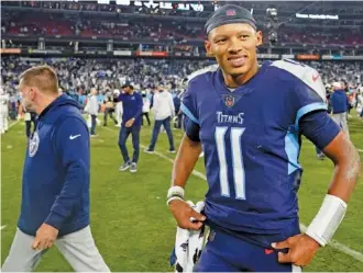  ?? AP PHOTO/ CHRIS CARLSON ?? Tennessee Titans quarterbac­k Joshua Dobbs leaves the field after making his first NFL start during a loss to the Dallas Cowboys last Thursday in Nashville. Dobbs, a former University of Tennessee standout who was signed off the Detroit Lions’ practice squad on Dec. 21, will start again when the Titans visit the Jacksonvil­le Jaguars on Saturday with the AFC South Division title up for grabs.