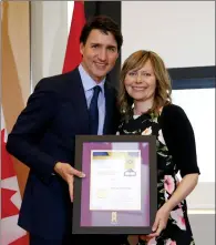  ?? SUBMITTED PHOTO ?? Donna Armstrong, a teacher at Crescent Heights High School, was honoured last week with a Prime Minister’s Award for Teaching Excellence, and received her plaque from the PM himself, Justin Trudeau.