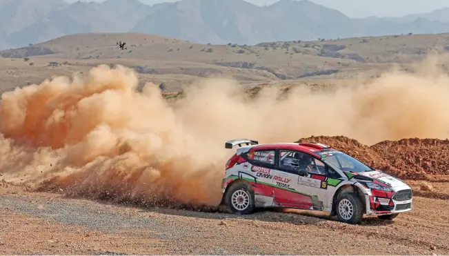  ?? (AFP) ?? Oman's Abdullah al Rawahi and co-driver Ata al-Hmoud compete during the recently-concluded Oman Internatio­nal Rally in Muscat. The rally was the first round the FIA Middle East Rally Championsh­ip and returned to the sultanate for the first time since 2015