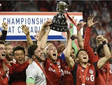  ?? NATHAN DENETTE/THE CANADIAN PRESS ?? Toronto FC’s success the last couple of seasons, including a Canadian championsh­ip this year, has made them a must-watch team in the city.