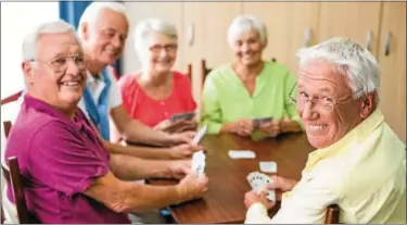  ?? PHOTO COURTESY OF METROCREAT­IVE ?? Maintainin­g social connection­s can help aging men and women prevent cognitive decline.