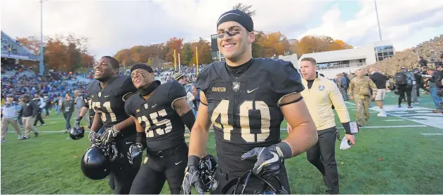  ?? DAVID WILD/ARMY WEST POINT ATHLETICS ?? Army running back Andy Davidson, an Emmaus High School graduate, hopes to finish his career Saturday with a 4-0 record against Navy.