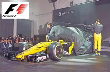  ?? AFP photo ?? Renault Sport Formula One drivers Jolyon Palmer and Nico Hulkenberg unveil the R.S.17, the team’s new car for the 2017, during a launch event at the Royal Horticultu­ral Halls in central London on February 21, 2017.-