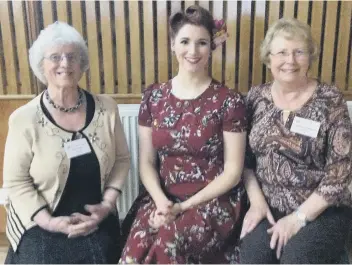  ??  ?? Gilpin WI secretary Win Warren, singer Samantha Holden, who entertaine­d at the meeting, and president Marian Ferguson. Gilpin WI meets in Kepier Hall, Houghton.