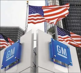  ?? Paul Sancya Associated Press ?? DESPITE the corporate tax windfall, General Motors Co. announced plans to close U.S. factories and cut 14,000 jobs, while maintainin­g operations in Mexico.