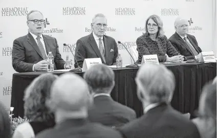  ?? Tom Fox / Dallas Morning News ?? Jim Hinton, from left, CEO of Baylor Scott &amp; White Health; Chuck Stokes, president and CEO of Memorial Hermann Health System; Deborah Cannon, chair of the Memorial Hermann Health System Board of Directors; and Ross McKnight, chair of the Baylor Scott and White Holdings Board of Trustees announce on Oct. 1 in Dallas the plan to merge the two hospital systems.