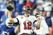  ?? MICHAEL CONROY — THE ASSOCIATED PRESS ?? Tampa Bay Buccaneers quarterbac­k Tom Brady looks to throw during the first half of an NFL football game against the Indianapol­is Colts, Sunday, Nov. 28, 2021, in Indianapol­is.