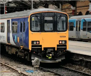  ?? RYAN TRANMER. ?? On March 19, Northern 319424 (left) and 150124 stand at Liverpool Lime Street. The operator has set new fares from the Merseyside station to Manchester, while also introducin­g new dedicated fares on other routes, but Barry Doe questions how this makes...