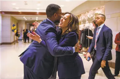  ?? Andrew Mangum / Special to The Chronicle ?? Sen. Kamala Harris, D-Calif., hugs a staff member after a Congressio­nal Black Caucus event in Washington.