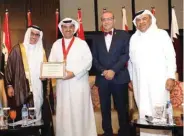  ??  ?? Waleed Al-Khashti receives ASRORG’s Gold Award for Excellence in Corporate Social Responsibi­lity in Dubai.