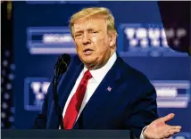  ?? ALYSSA POINTER / ALYSSA.POINTER@AJC.COM ?? President Donald Trump speaks to supporters during a Blacks for Trump campaign rally inside the Cobb Galleria Centre on Friday.