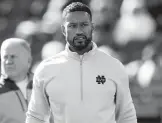  ?? PAUL SANCYA/AP ?? Notre Dame defensive coordinato­r Marcus Freeman was promoted to head coach following the sudden departure of Brian Kelly to LSU.