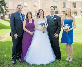  ?? SUBMITTED PHOTO ?? Dave Burdeniuk with his family — wife Randa, daughter Trelle and her husband Graham Kolojay, and daughter Cassia — at Trelle and Graham’s wedding in July 2014.