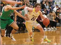  ?? BARRY BOOHER — FOR THE NEWS-HERALD ?? Riverside’s Andrew Taggart drives against Mayfield on Feb. 17.