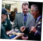  ??  ?? CLOSE ACQUAINTAN­CES: David Whiteford with Prince Charles in 2010