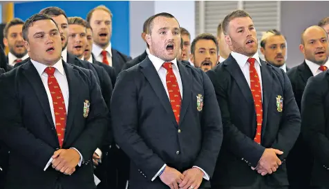  ??  ?? The Lions sing Calon Lan in Auckland and, conductor Haydn James