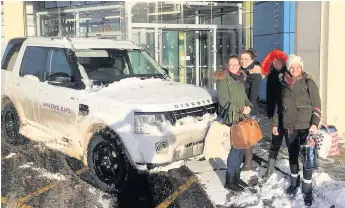  ??  ?? TO THE RESCUE Ross McKinnon used firm’s 4x4s to transport staff to children’s hospital in Glasgow