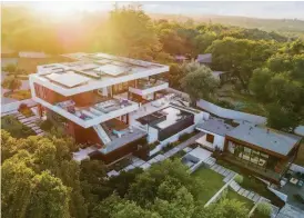  ?? ?? This architectu­ral masterpiec­e at 10718 & 0 Mora Dr. in the Los Altos Hills was designed by the renowned Swatt | Miers team and listed at $24.5 million.