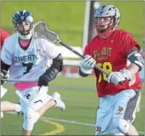  ?? PETE BANNAN — DIGITAL FIRST MEDIA ?? West Chester East’s Joe Sivo passes the ball as Rustin midfielder Dylan Perko (7) gives chase Tuesday evening.