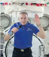  ?? FRAME GRAB FROM THE CANADIAN SPACE AGENCY ?? CSA astronaut David Saint-Jacques answers questions from media aboard the Internatio­nal Space Station.