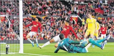  ??  ?? Manchester United's Mason Greenwood (C) and Tahith Chong (L) in action against Astana in the Europa League at Old Trafford.
REUTERS