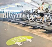  ??  ?? Fit for purpose: gym users could face big changes to their workouts including the use of masks and gloves, and social distancing measures in place