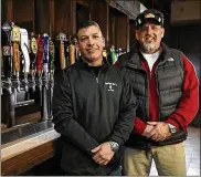  ?? THE COLUMBUS DISPATCH ?? This 2013 file photo shows Paul Rockwell (right), owner, andMikePor­reca, co-owner, ofAverage Joe’sPuband Grill.