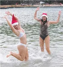  ??  ?? Emily Marsh and Lois Nagle celebrate at Tallebudge­ra Creek.