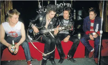  ?? Picture: RICHARD AARON/REDFERN ?? PUNK ROCK BRAND: Sex Pistols members Paul Cook, Sid Vicious, Steve Jones and Johnny Rotten. The band’s ‘Anarchy in the UK’ and ‘Never Mind the Bollocks’ album artwork will feature on Virgin Money credit cards