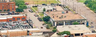  ?? [PHOTO BY DOUG HOKE, THE OKLAHOMAN ARCHIVES] ?? The upcoming move of Mercedes-Benz from 1220 N Broadway will free up four blocks of prime real estate for redevelopm­ent.