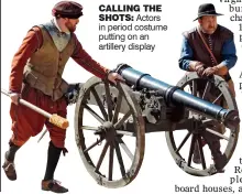  ??  ?? CALLING THE
SHOTS: Actors in period costume putting on an artillery display