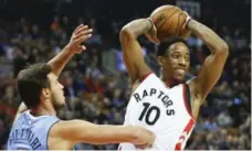  ?? BERNARD WEIL/TORONTO STAR ?? DeMar DeRozan, right, struggled with his shooting in the third quarter Monday and still finished with 33 points for the Raptors.