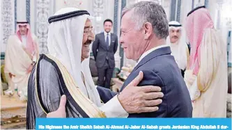  ??  ?? His Highness the Amir Sheikh Sabah Al-Ahmad Al-Jaber Al-Sabah greets Jordanian King Abdullah II during the meeting.