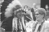  ?? ADRIAN WYLD / THE CANADIAN PRESS ?? Assembly of First Nations Chief Perry Bellegarde speaks Friday with Ontario Premier Kathleen Wynne.