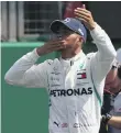  ??  ?? Lewis Hamilton eyes a record sixth British Grand Prix win as he took the pole at Silverston­e