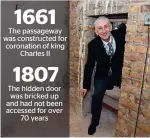  ??  ?? HIDDEN DOOR: Speaker of the House of Commons Lindsay Hoyle visiting the secret chamber concealing a 360-year-old blocked passageway. — AFP