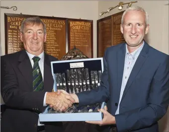  ??  ?? Baltinglas­s Golf Club’s Captain’s Prize runner up Fergal Doogue collects his prize from John Kelly.