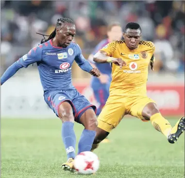  ??  ?? MIDFIELD BATTLE: Supersport United’s Reneilwe Letsholony­ane is challenged by Kaizer Chiefs’ George Maluleka during last night’s MTN8 quarter-final match at Moses Mabhida Stadium in Durban.