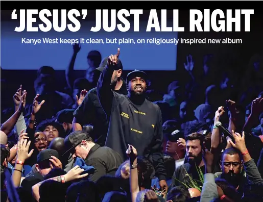  ?? KEVIN WINTER/GETTY IMAGES ?? Kanye West performs Wednesday during an unveiling of his “Jesus Is King” album and film at The Forum in Inglewood, California.