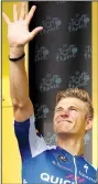  ?? AP/CHRISTOPHE ENA ?? of Germany holds up five fingers Wednesday to celebrate his fifth stage victory at the Tour de France. Britain’s Chris Froome retained the overall race lead.