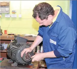  ??  ?? Technician Dermot Murphy working in one of the fully contained units on the Workshop Floor at Avonmore Electrical.