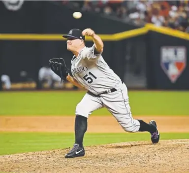  ?? John Leyba, Denver Post file ?? Rockies relief pitcher Jake McGee, competing during the NL wild-card game in October, stepped up his game in 2017 after an injury-plagued first season in Colorado in 2016.