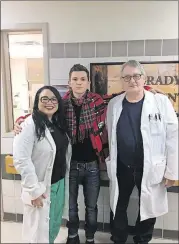  ?? CONTRIBUTE­D PHOTOS BY ALLIED INTEGRATED MARKETING ?? Actor Tom Holland, the latest Spider-Man on the big screen, with Dr. Rachel Williams and Dr. Walter Ingram at Grady Memorial Hospital.