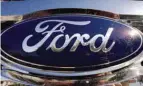  ??  ?? The Ford logo on a truck in Manhattan Beach, California. — AFP