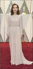  ?? JORDAN STRAUSS, THE ASSOCIATED PRESS ?? Isabelle Huppert wears Armani Prive.