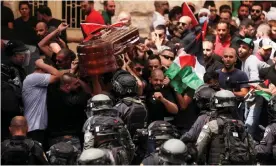  ?? Photograph: Ammar Awad/Reuters ?? ‘Mourners at the funeral of Shireen Abu Aqleh in Jerusalem were attacked by batonwield­ing police.’