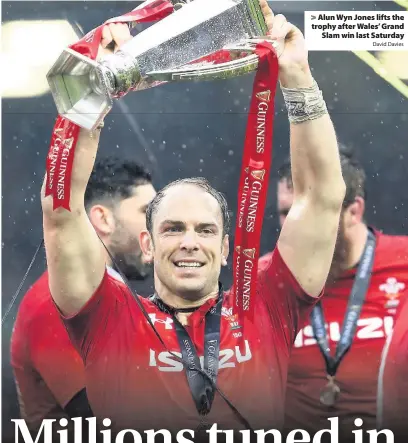  ?? David Davies ?? &gt; Alun Wyn Jones lifts the trophy after Wales’ Grand Slam win last Saturday