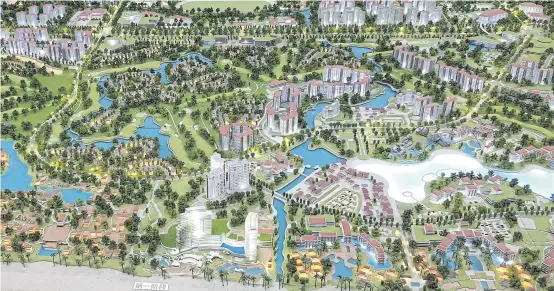  ?? PHOTOS BY REUTERS ?? A model of the resort project by Suncity Group Holdings Ltd with nearby constructi­ons is shown.